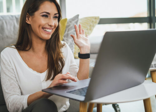 Photo of a woman getting a telemedicine appointment from home