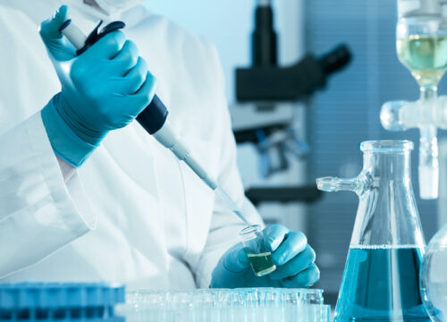 Photo of a medical doctor working in a lab